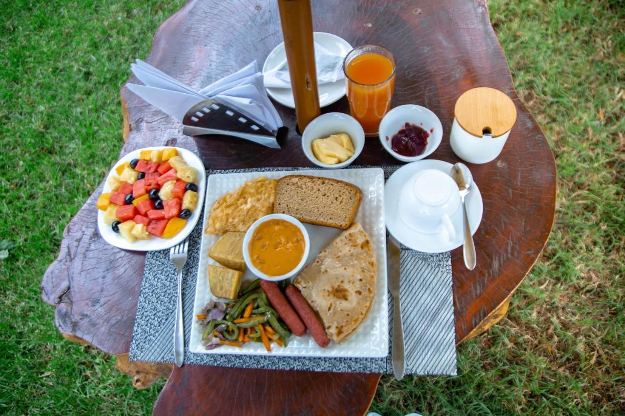 Shose Farmhouse Chalets & Campsite モシ エクステリア 写真